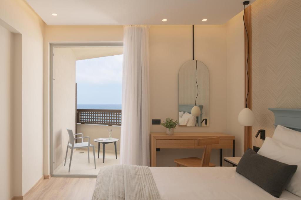 Postel nebo postele na pokoji v ubytování Hotel Ideon