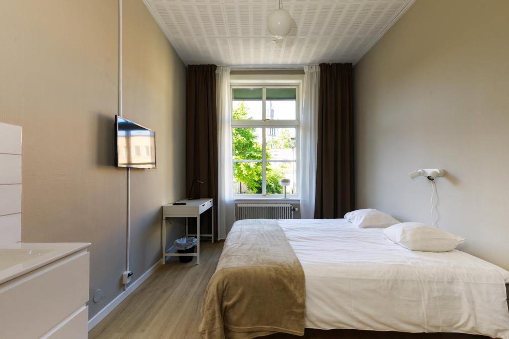 Postel nebo postele na pokoji v ubytování Nicolai B&B