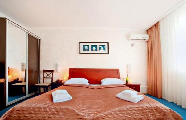 Postel nebo postele na pokoji v ubytování Hotel Marinara