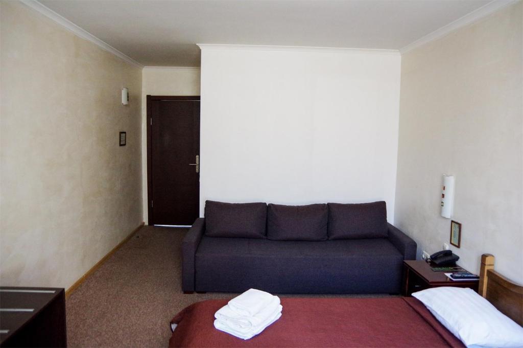 Postel nebo postele na pokoji v ubytování Hotel Marinara