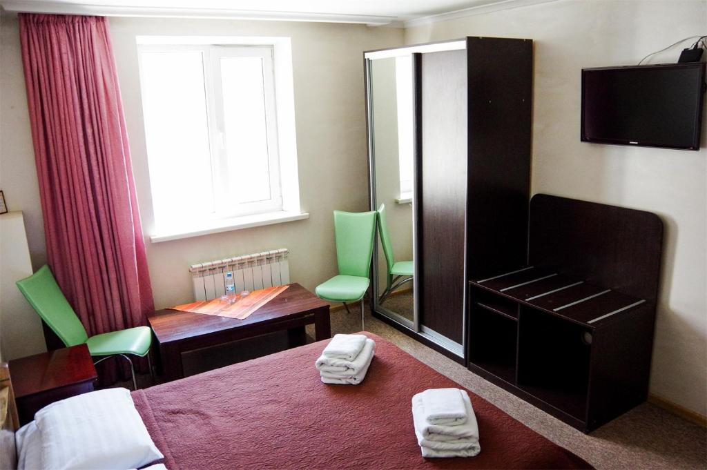 Postel nebo postele na pokoji v ubytování Hotel Marinara