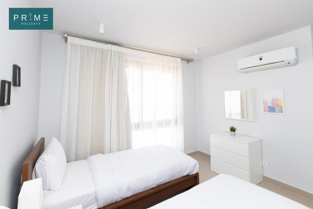 Postel nebo postele na pokoji v ubytování Prime Holidays Caesar Bay