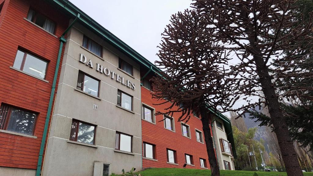 a building with the words drexel on the side of it at Hotel Diego de Almagro Coyhaique in Coihaique