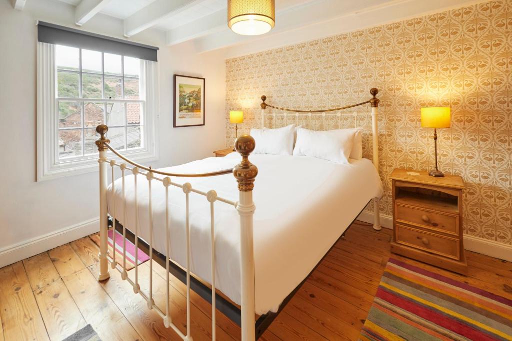 Postel nebo postele na pokoji v ubytování Host & Stay - Hampdon Cottage