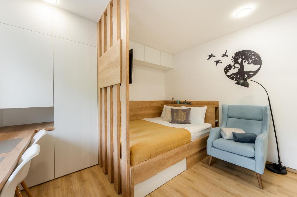 Postel nebo postele na pokoji v ubytování Apartments Gros