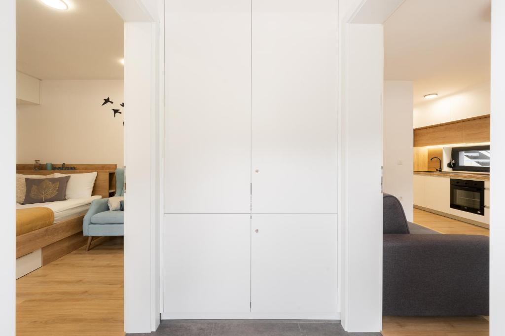 Postel nebo postele na pokoji v ubytování Apartments Gros