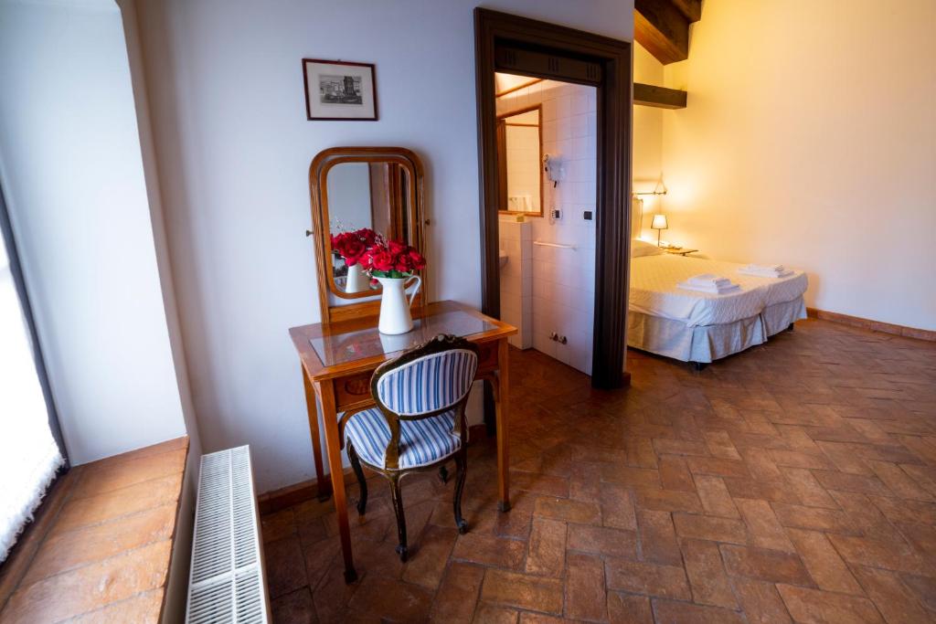 Posteľ alebo postele v izbe v ubytovaní Volpe Pasini - Wine and Rooms