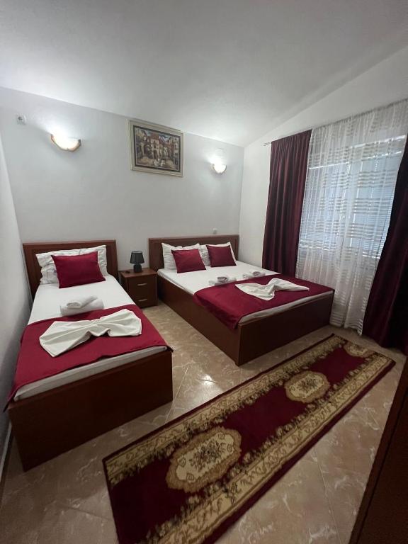 Postel nebo postele na pokoji v ubytování Kasneci Apartments