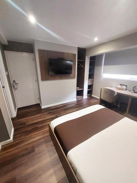 Postel nebo postele na pokoji v ubytování Equo Hotel Boutique