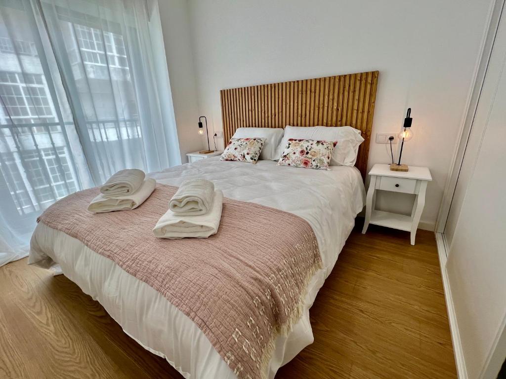 Posteľ alebo postele v izbe v ubytovaní Balnea Casa Victoria
