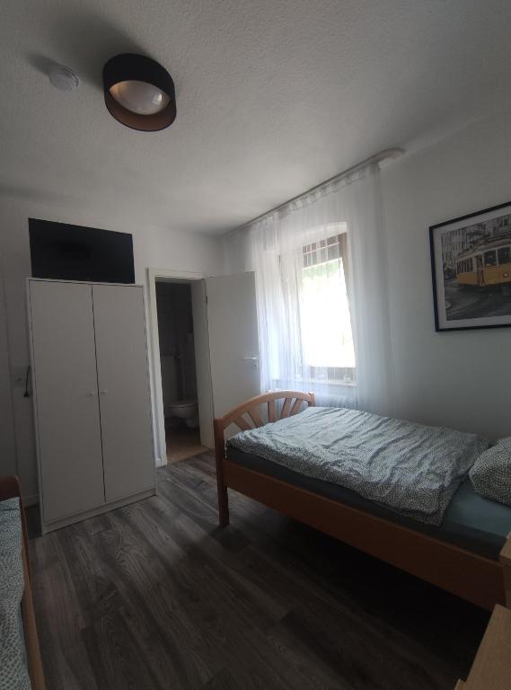 Postel nebo postele na pokoji v ubytování Gasthaus L&A Kunz