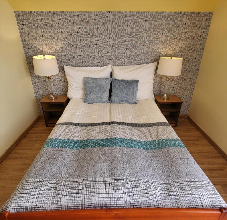 Ein Bett oder Betten in einem Zimmer der Unterkunft Ewa wczasy