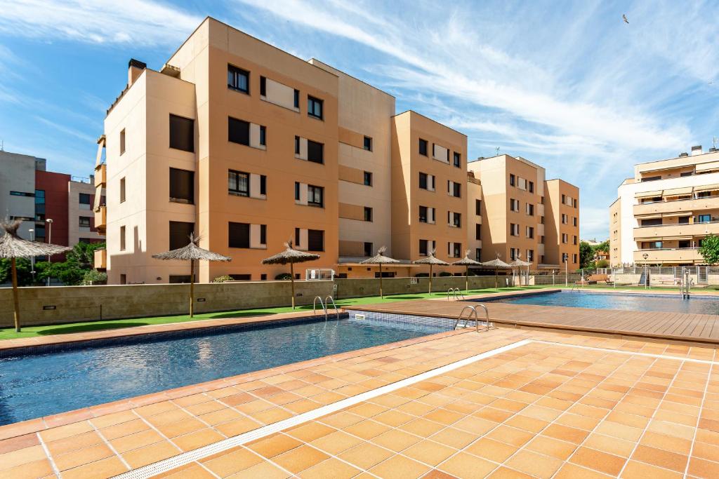 Bazén v ubytovaní Apartamento Narcis alebo v jeho blízkosti