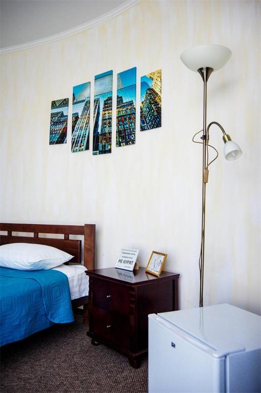 Postel nebo postele na pokoji v ubytování Hotel Marinara