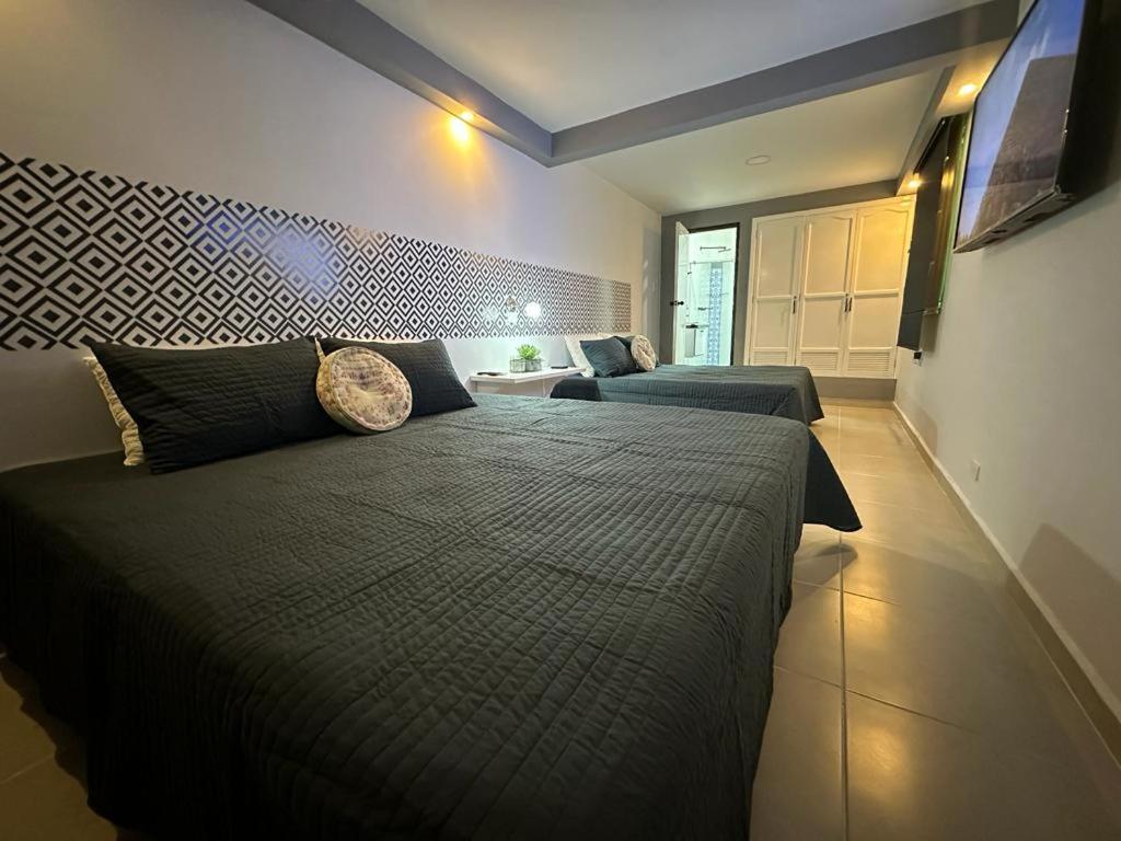 Postel nebo postele na pokoji v ubytování CASA10 DIEZ En TODO !