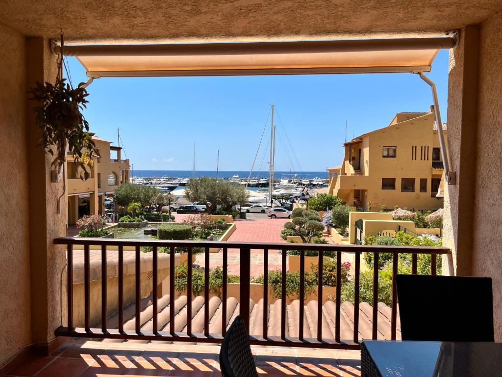 a balcony with a view of a marina at Brisa Marina, Altea in Alicante