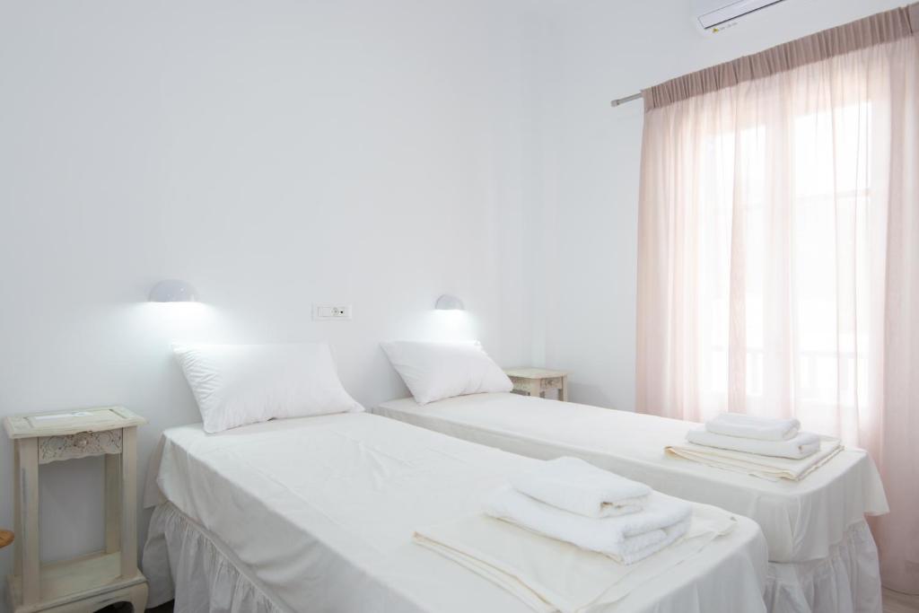 Postel nebo postele na pokoji v ubytování Hotel Sofia