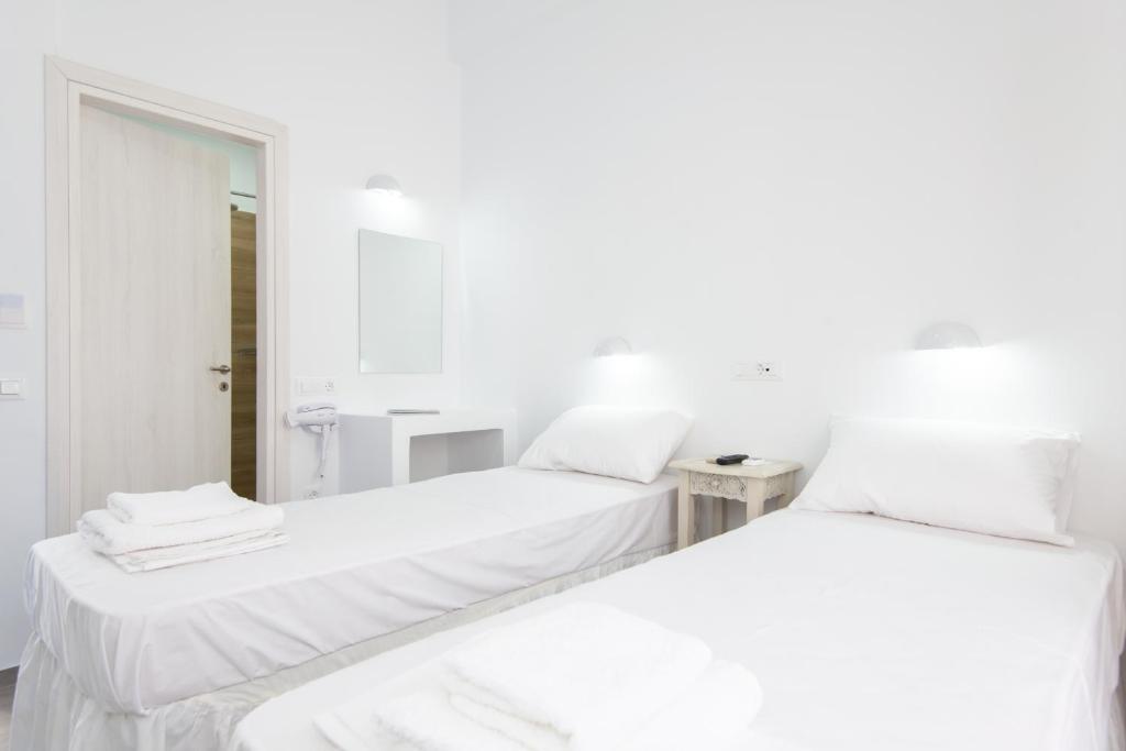 Postel nebo postele na pokoji v ubytování Hotel Sofia