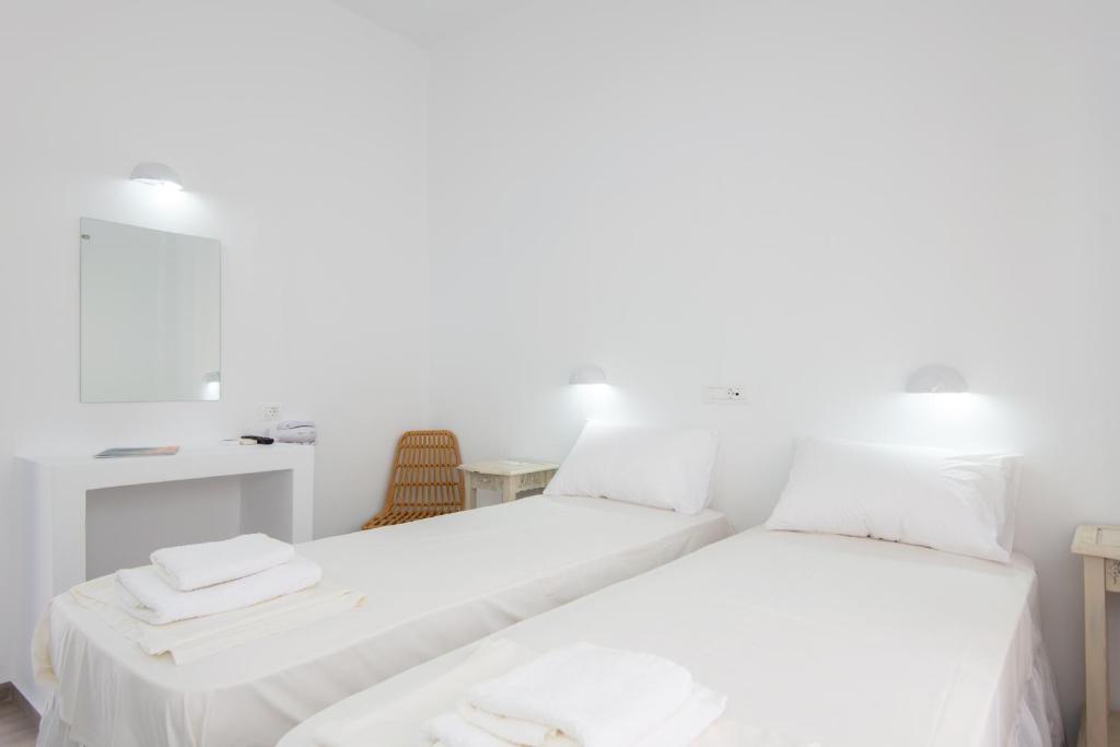 Postel nebo postele na pokoji v ubytování Hotel Sofia