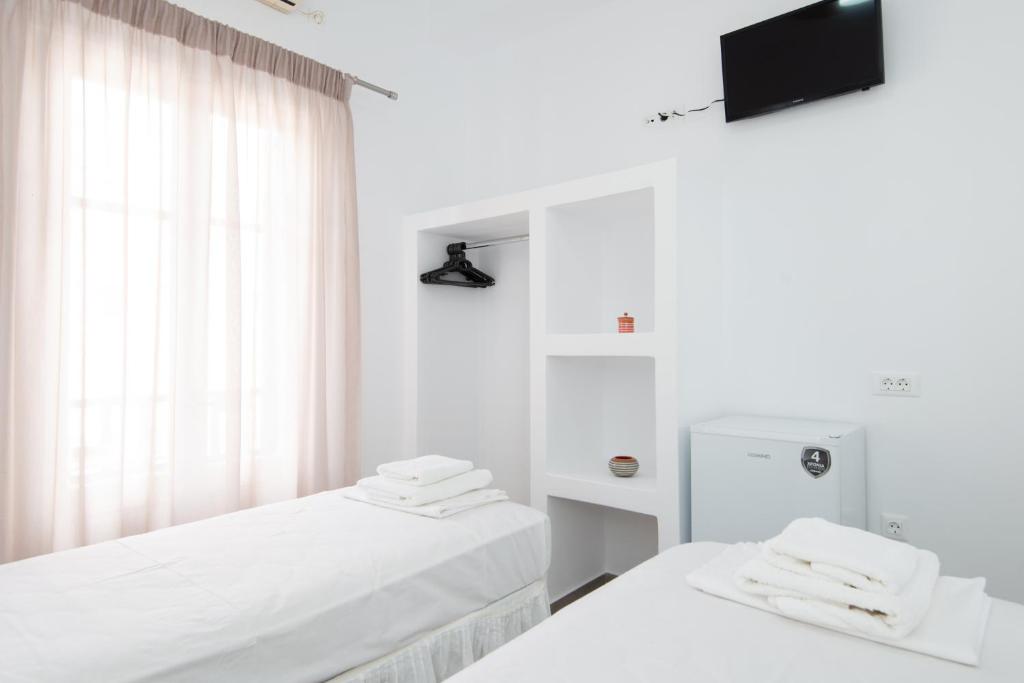 Postel nebo postele na pokoji v ubytování Hotel Sofia