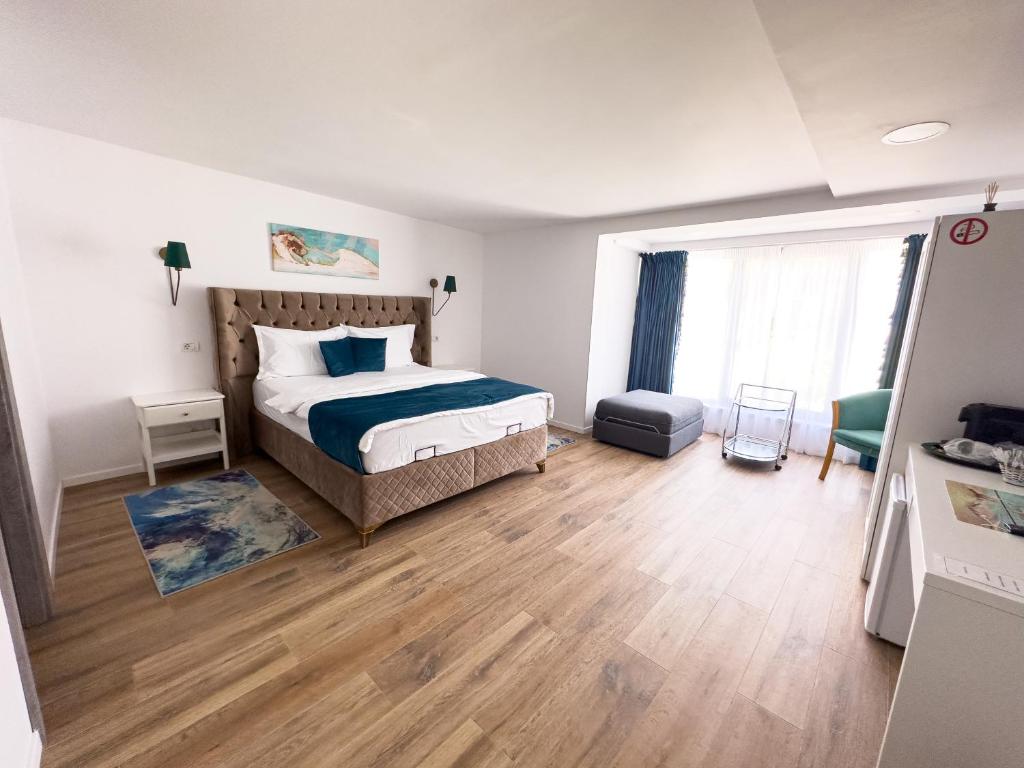 Una cama o camas en una habitación de Avenue Venus - Avenue Hotels