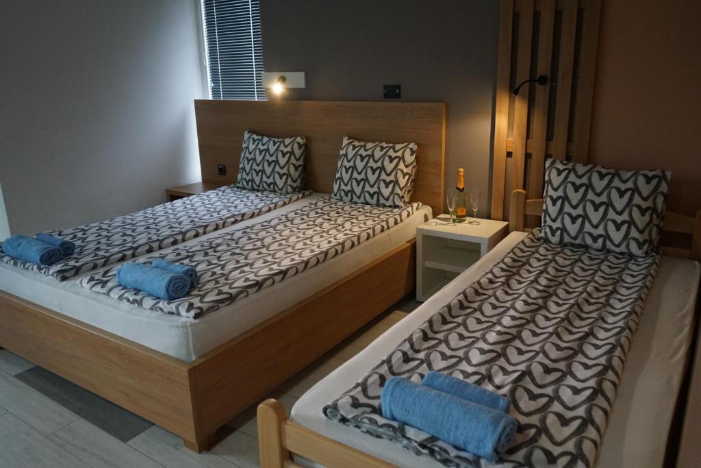 Postel nebo postele na pokoji v ubytování Siesta Srebrno Jezero