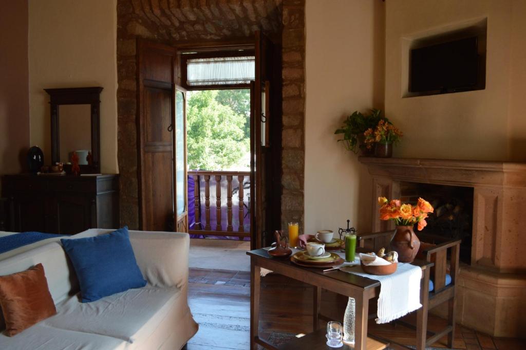Posezení v ubytování Hotel Casa del Naranjo