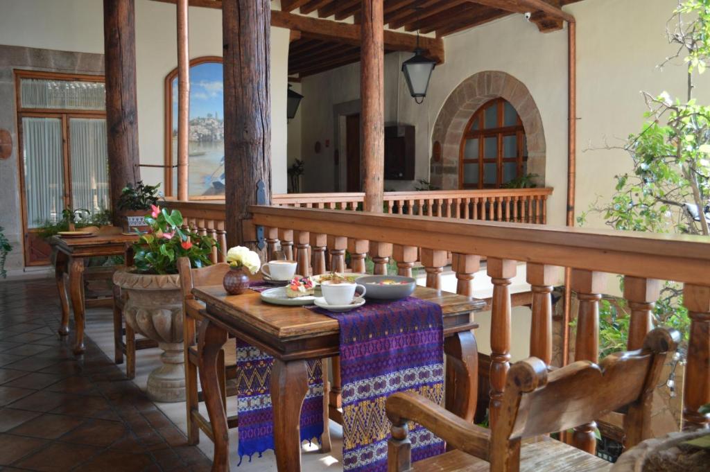 Restaurace v ubytování Hotel Casa del Naranjo