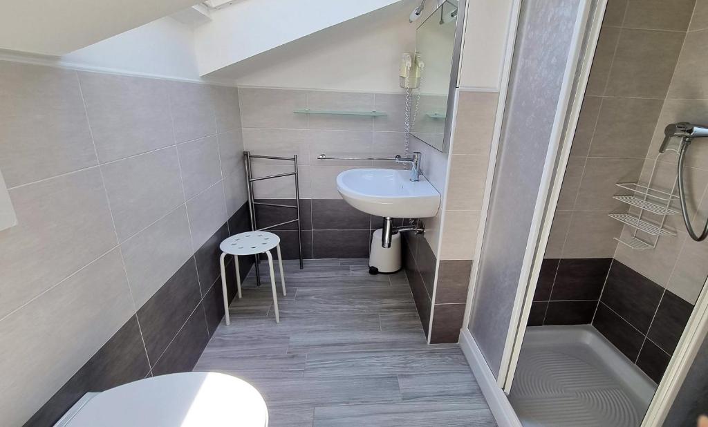 Koupelna v ubytování Hotel Canoa