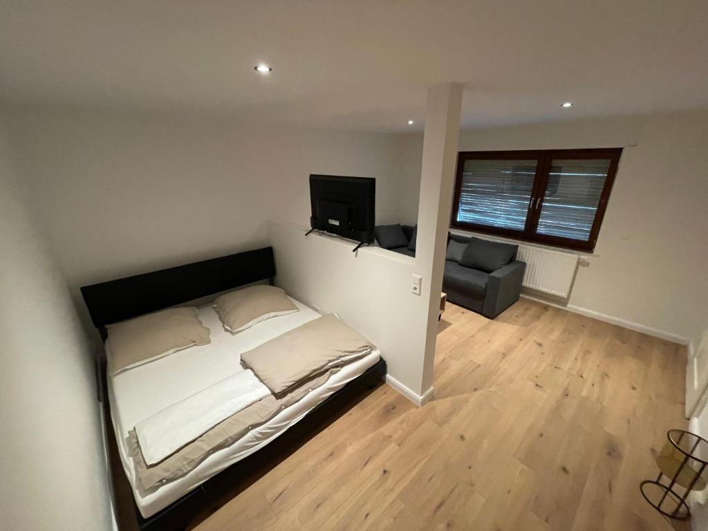 Postel nebo postele na pokoji v ubytování SmartStay2