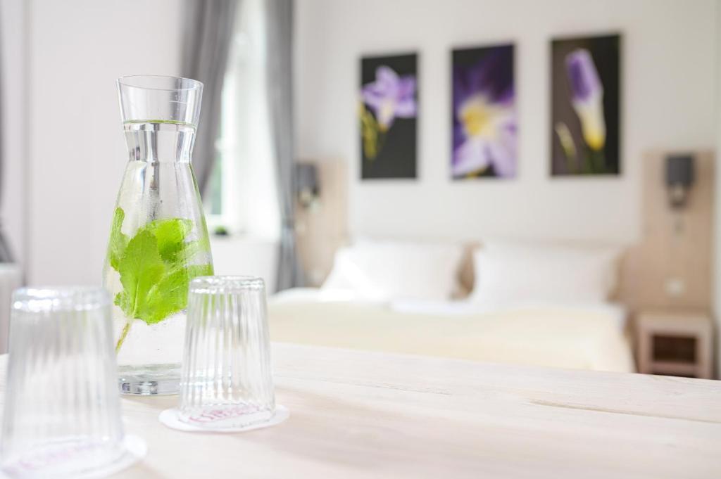 Postel nebo postele na pokoji v ubytování Pension Kleine Residenz