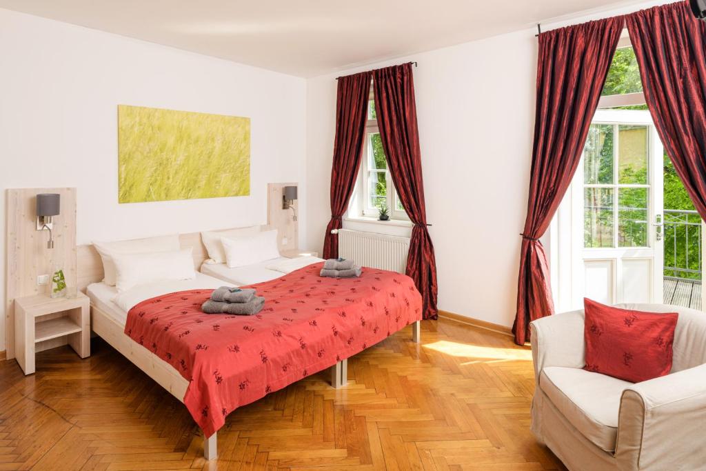 Postel nebo postele na pokoji v ubytování Pension Kleine Residenz