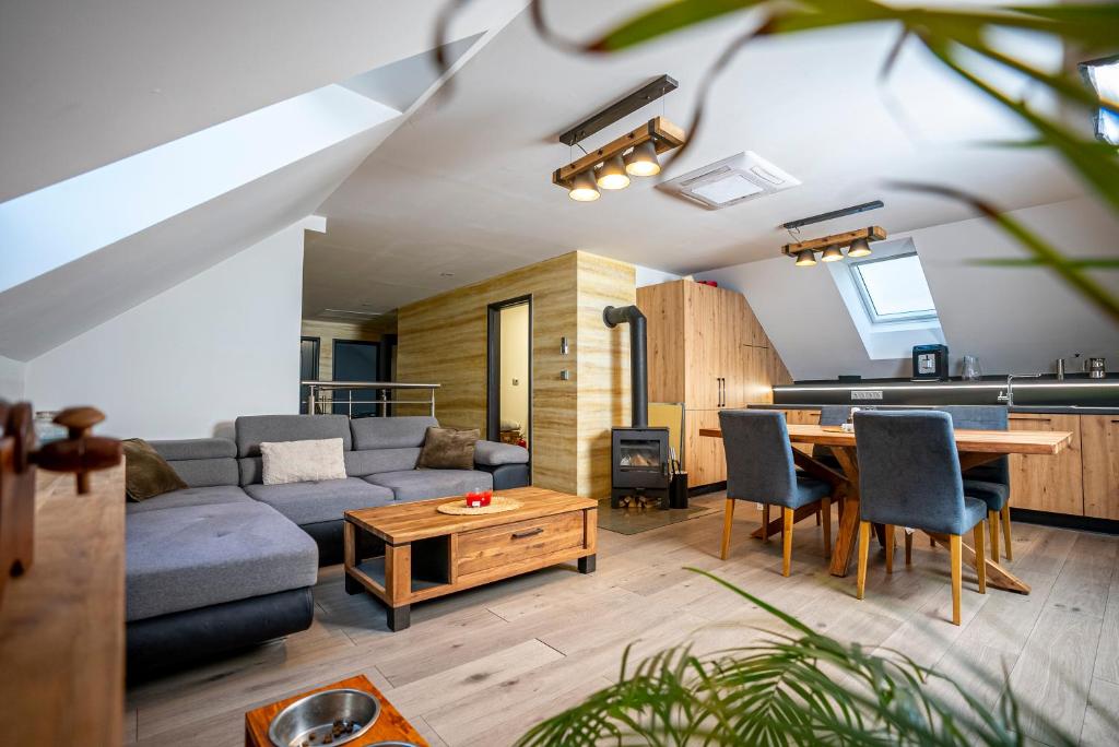 Posezení v ubytování Apartmány v Podzámčí