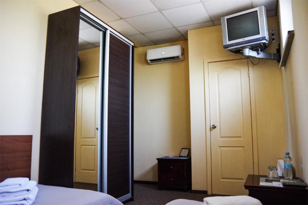 TV a/nebo společenská místnost v ubytování Hotel Marinara