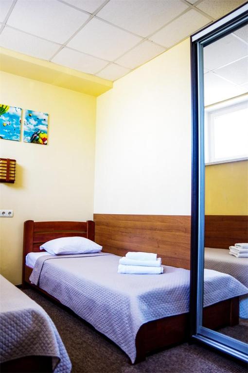 Postel nebo postele na pokoji v ubytování Hotel Marinara