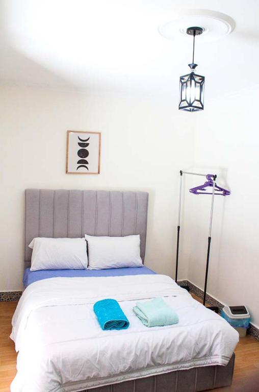 Postel nebo postele na pokoji v ubytování Akwaba lodge