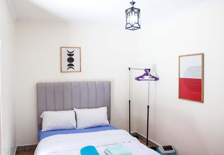 Postel nebo postele na pokoji v ubytování Akwaba lodge