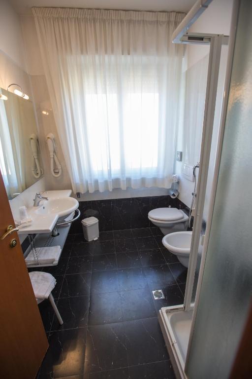Koupelna v ubytování Hotel Rossi