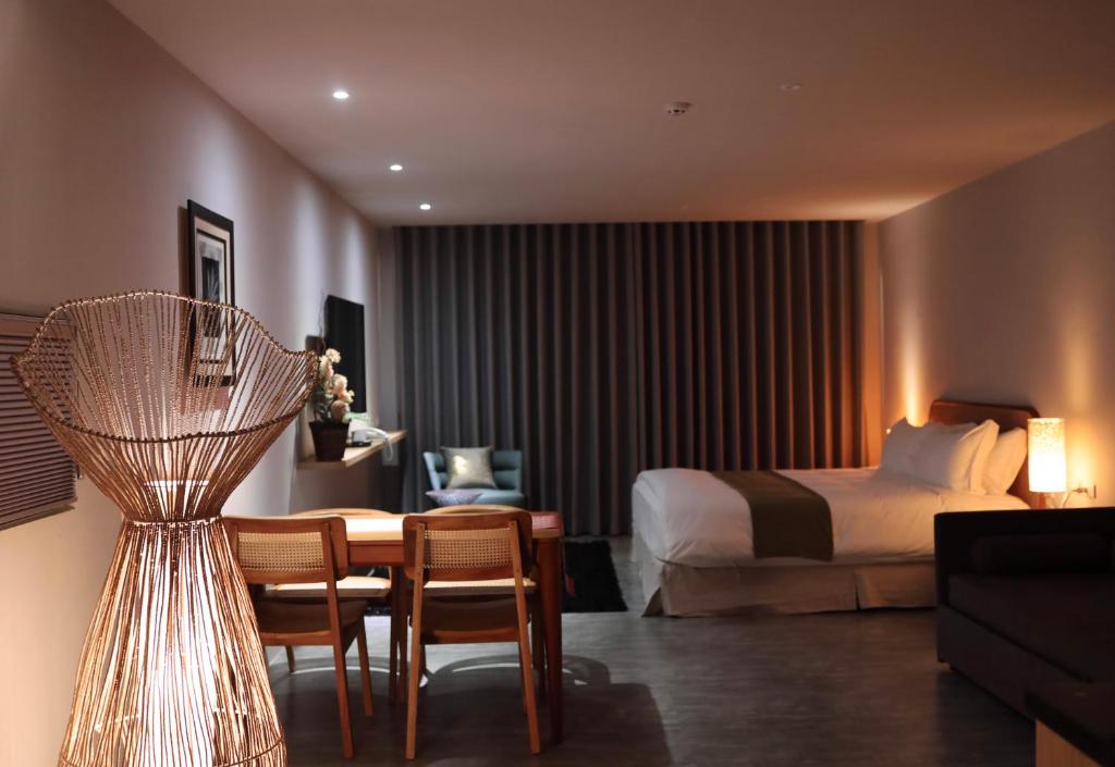 Area soggiorno di The MSUG Hotel
