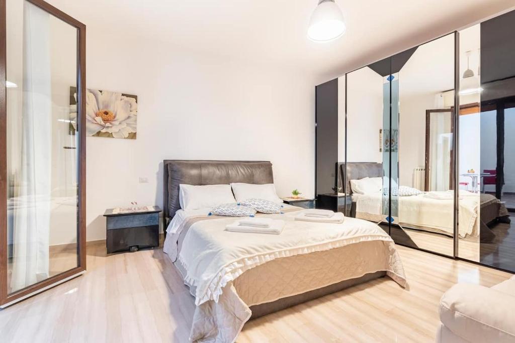 Postel nebo postele na pokoji v ubytování Muccino B&B