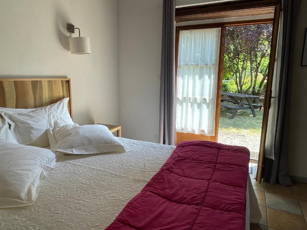 Postel nebo postele na pokoji v ubytování Inspirations - Chambres d'hôtes