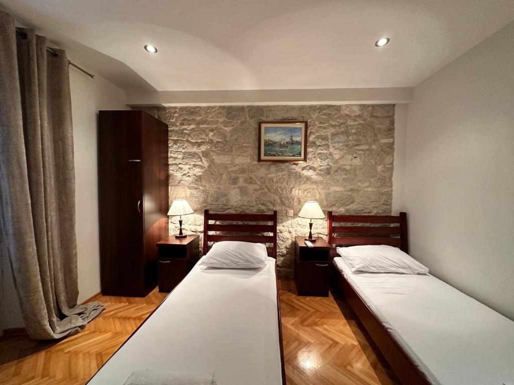 Postel nebo postele na pokoji v ubytování Villa Dante