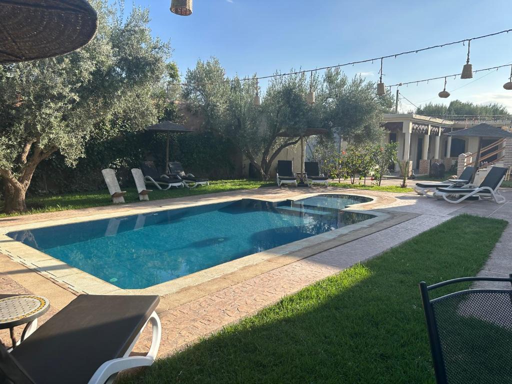 Bazén v ubytování Oasis Merasi Marrakech nebo v jeho okolí