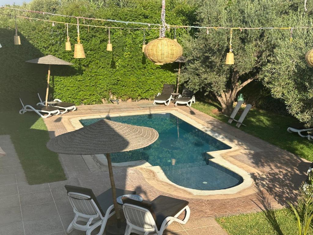 Bazén v ubytování Oasis Merasi Marrakech nebo v jeho okolí