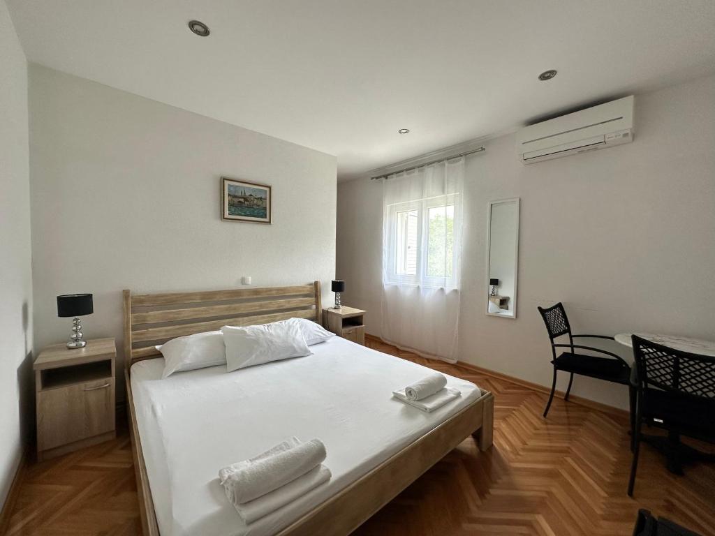 Postel nebo postele na pokoji v ubytování Villa Dante