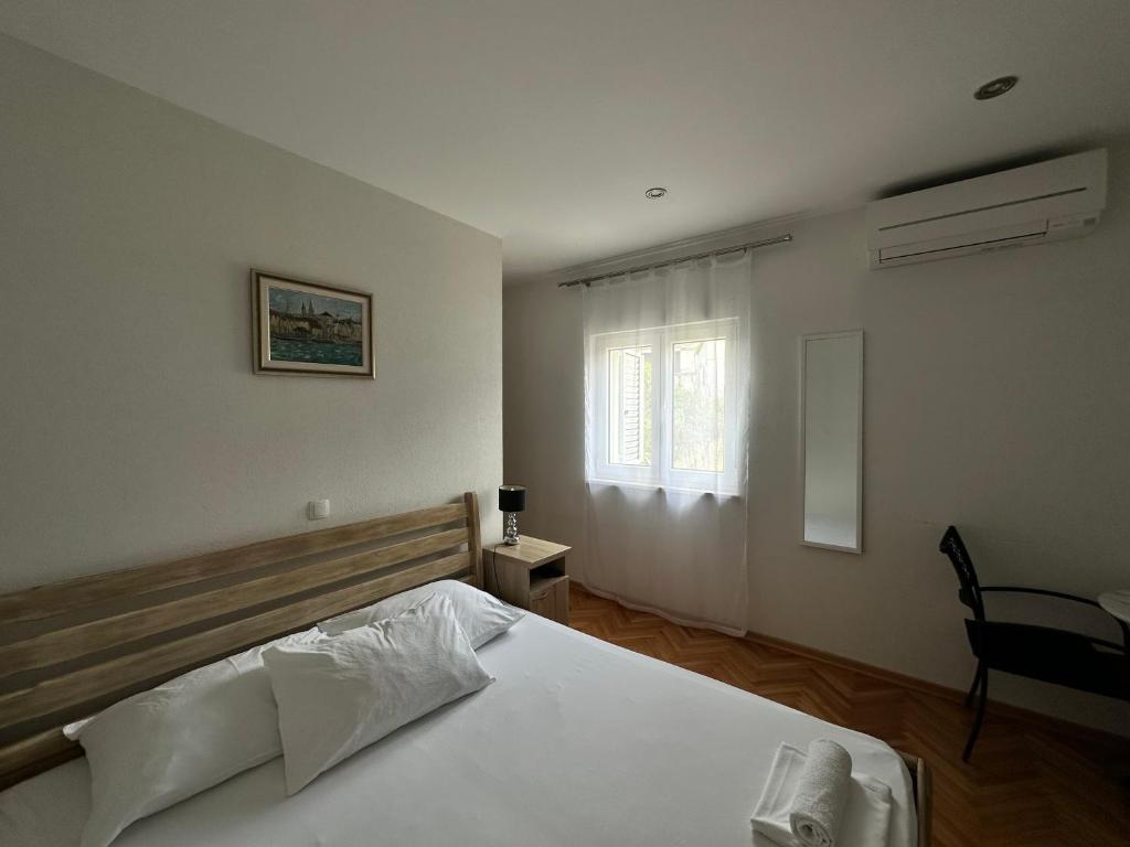 Postel nebo postele na pokoji v ubytování Villa Dante