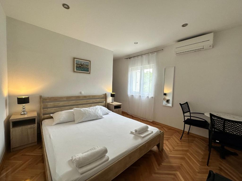 Postel nebo postele na pokoji v ubytování Villa Dante