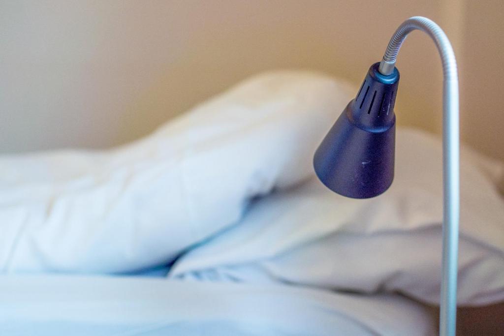 Postel nebo postele na pokoji v ubytování Solborg Folkehøgskole Hostel