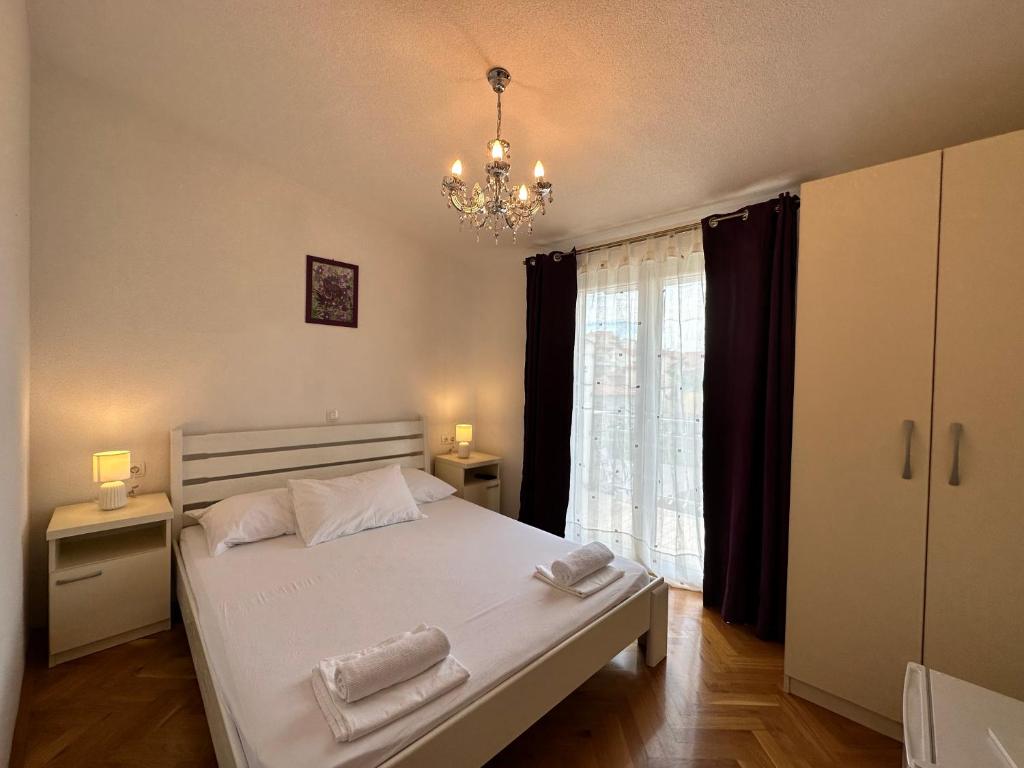 Postel nebo postele na pokoji v ubytování Villa Dante