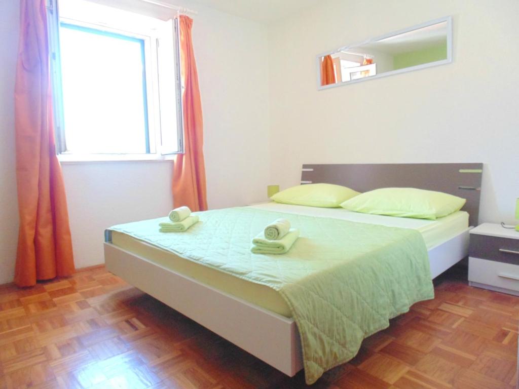 Postel nebo postele na pokoji v ubytování Guest House Petricevic